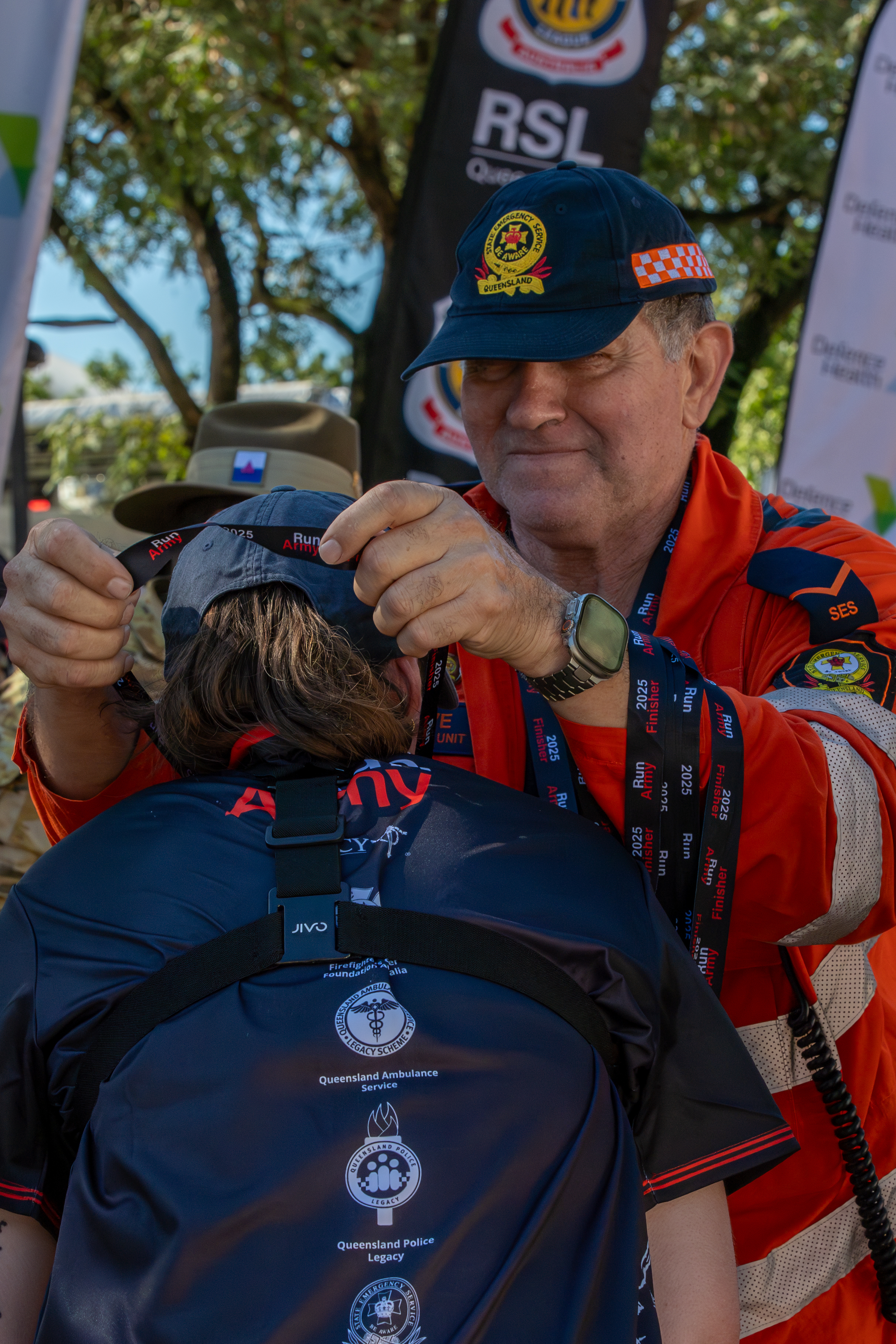 SES volunteer awarding Run Army medal