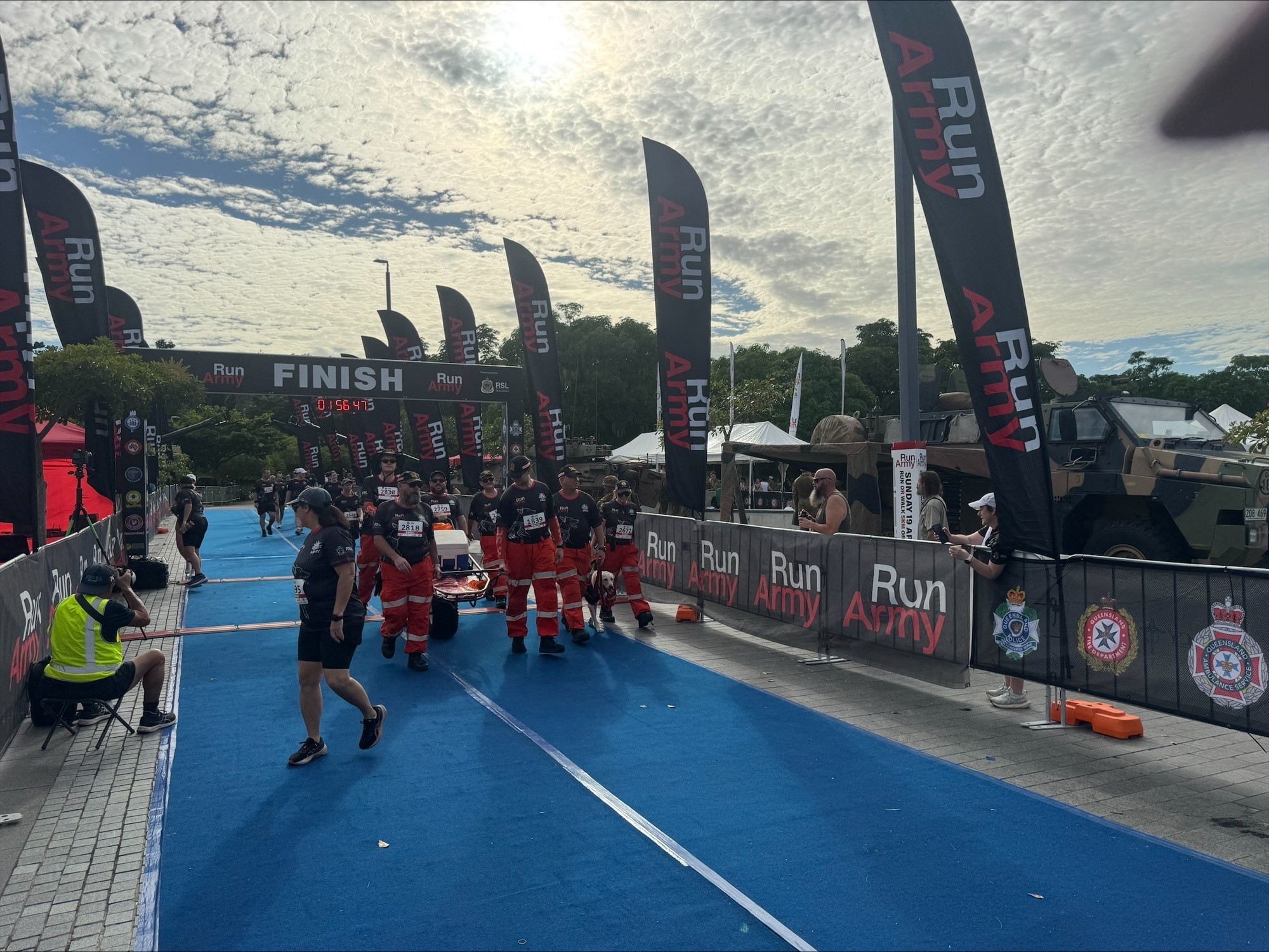 SES members walking across the finish line of Run Army.