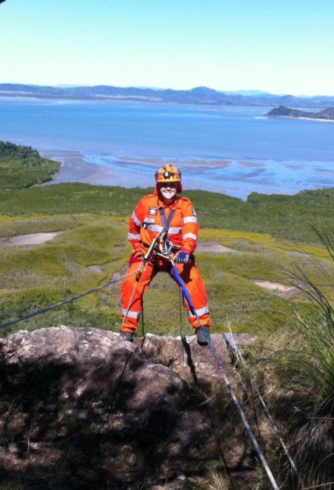 SES member Cindel preparing to abseil outdoors.