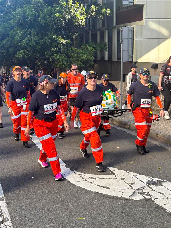 SES Members walking in Run Army.