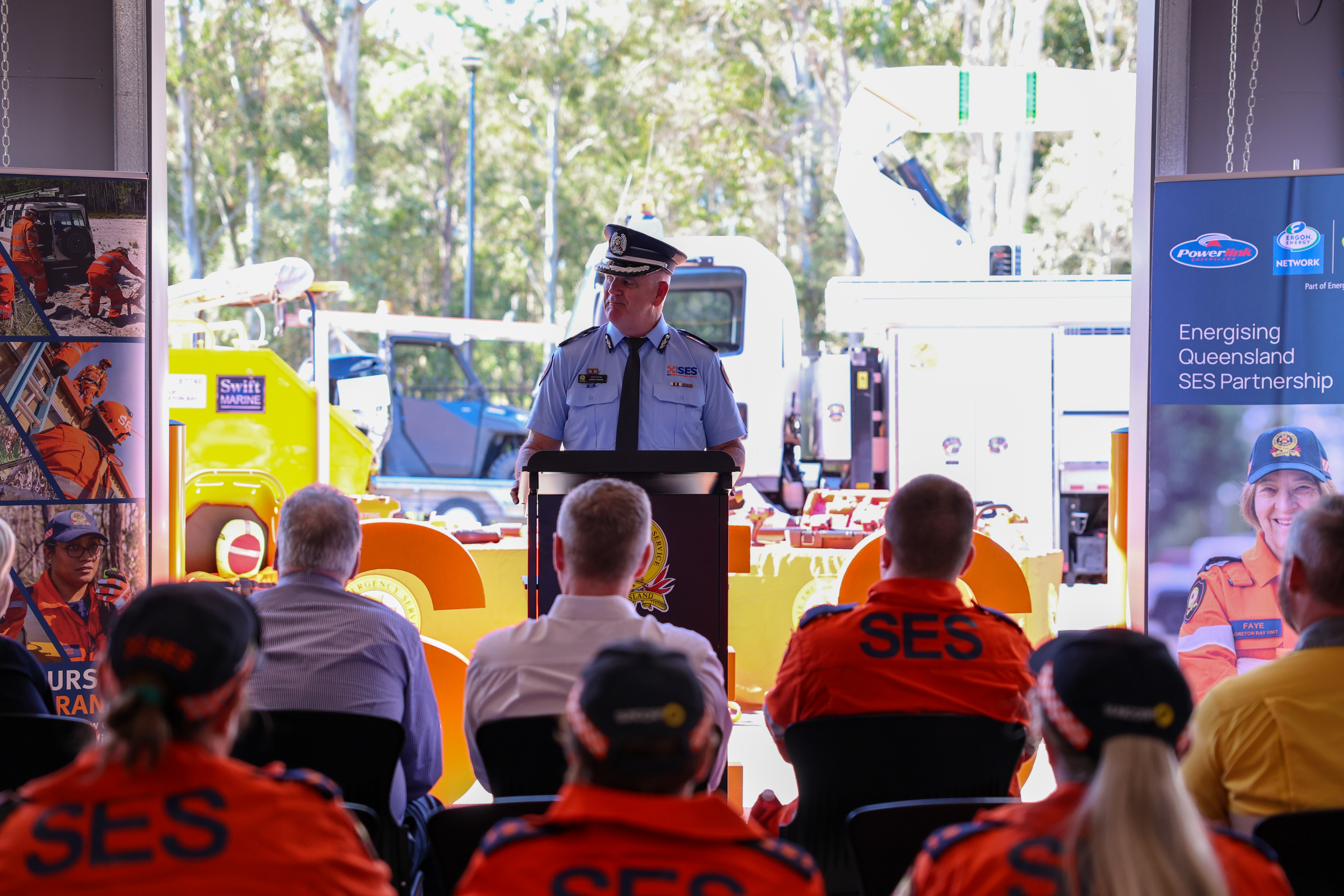 SES Chief Officer Danny Baade addressing audience of volunteers and employees in SES depot.